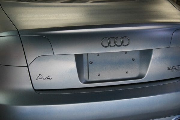 Pewter Titanium Candy Color Pearls being vehicle dipped on an Audi