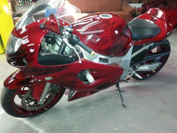 Ruby Red candy pearls painted on a user's bike.