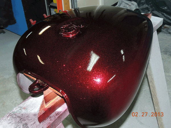 Fire Red Motorcycle tank sprayed with our .004" Fire Red Flake.