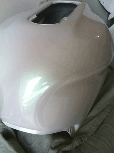 Green Shimmer Phantom Pearl Custom Painted Motorcycle tank.